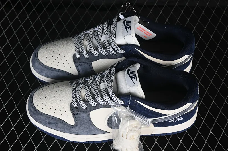 All Categories Nk SB Dunk Series Nk SB Dunk Low High-end Customized Low-top Shoes Nike SB Dunk Low North Face Co-branded Beige and Blue Smiley Anniversary High-end Customized Low-top Casual Shoes MN1688-102